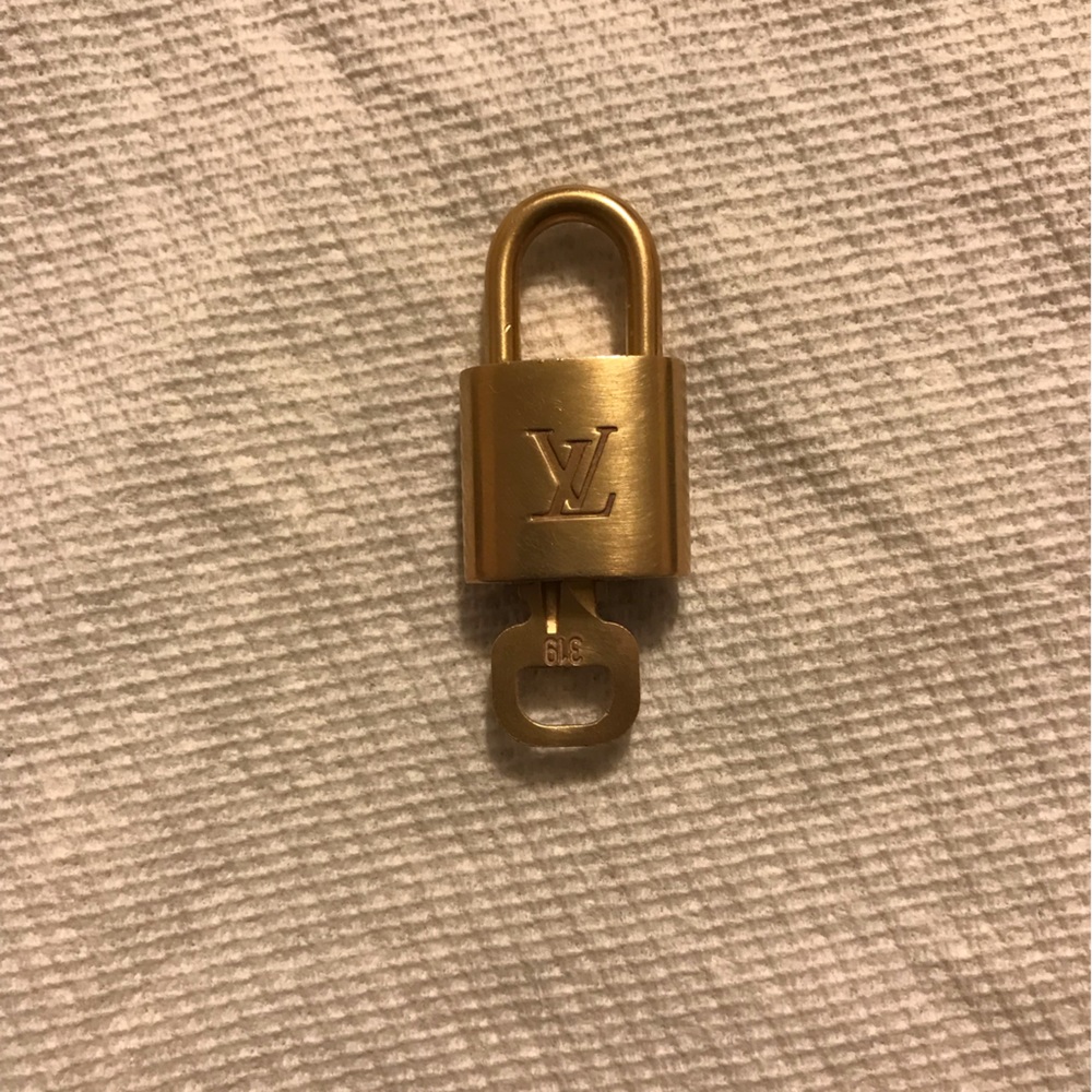 Louis Vuitton Gold Padlock with Key